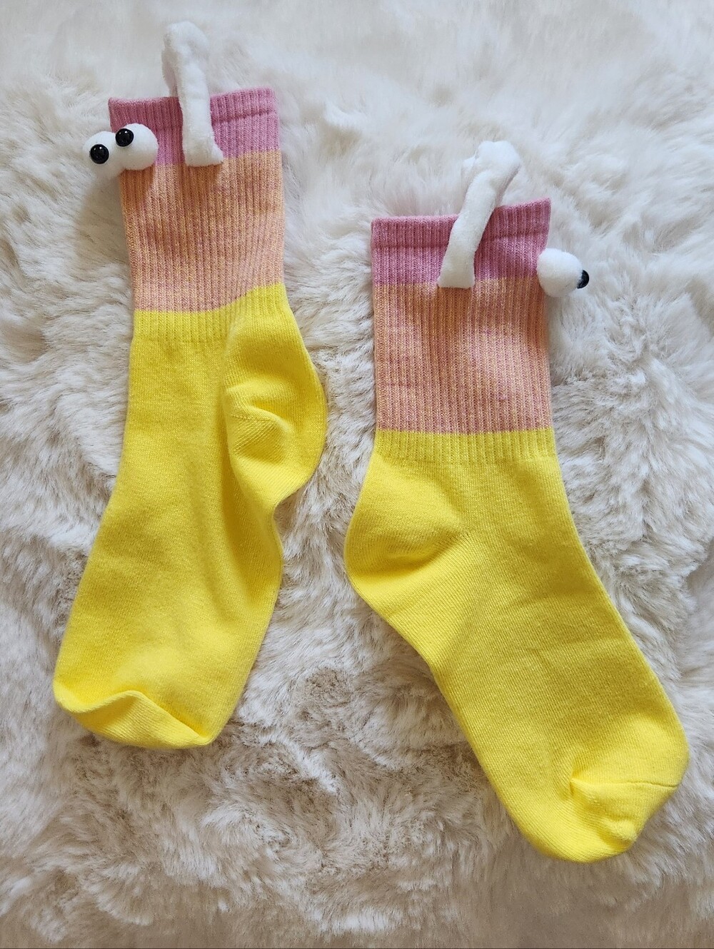 Socks with eyes and arms